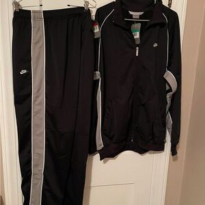 Brand New! XL Nike Set Black Jacket & Pants with Gray stripe .